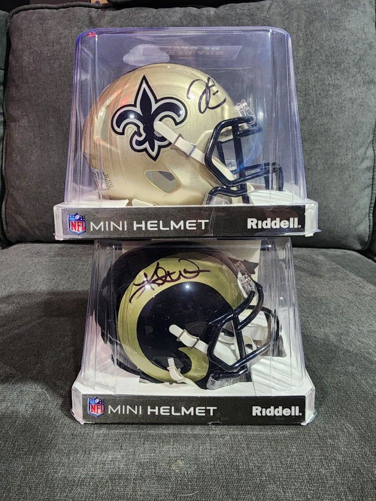 Derek Carr Saints Signed Mini Helmet and a Kurt Warner Rams Signed Mini Helmet