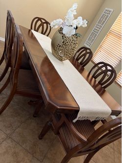 Dinner table with six chairs