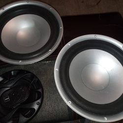 Two 10" Polk Audio Subwoofers + one 6.5" Boss Chaos Exxtreme Speaker