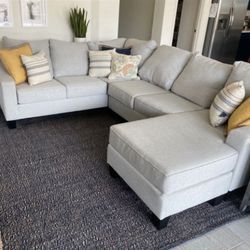 Light Gray Mor Furniture 3pc 115” by 90” Sectional Sofa with Reversible Chaise