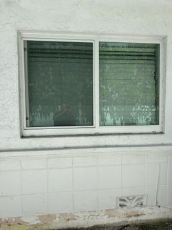 Impact window - horizontal roller