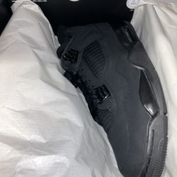 Black Cat Jordan 4s