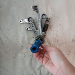 02-03 Honda OEM 954 RR Right Foot Peg Bracket Lever