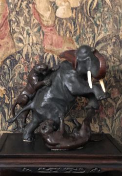 16th century bronze elephant being attacked by two tigers