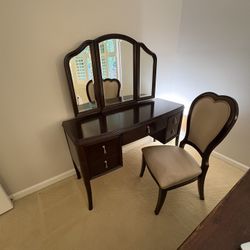 Wood Makeup Vanity With Storage And Arched Mirrors And Matching Chair