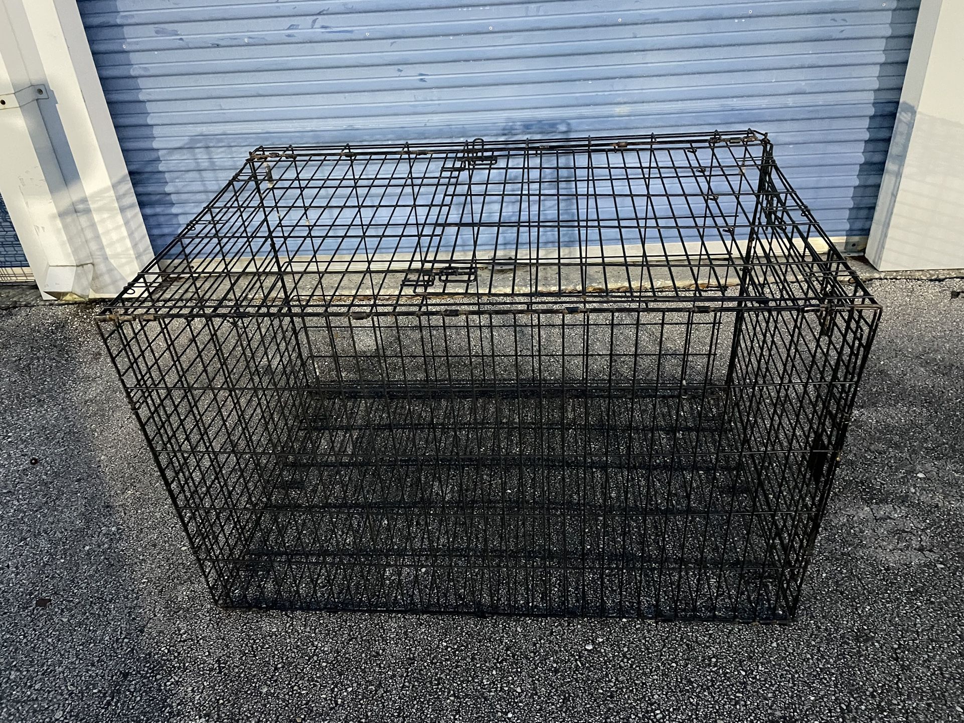 Large Dog Kennel -( size: 32”x 48”x 30” in high, no tray, comes with double doors )- Used