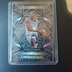 A 2024 Panini Obsidian Vitreous Anthony Edwards card has an ungraded value around