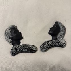 Vintage carved female busts from black coral from the middle ages, silhouette, hanging on the wall of beauties with black coral, made in Hawaii, there