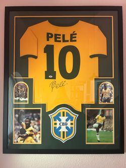 Pele signed Brazil soccer jersey framed. Psa/Dna coa