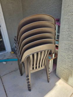 Stackable plastic chairs $15 for 6 chairs!