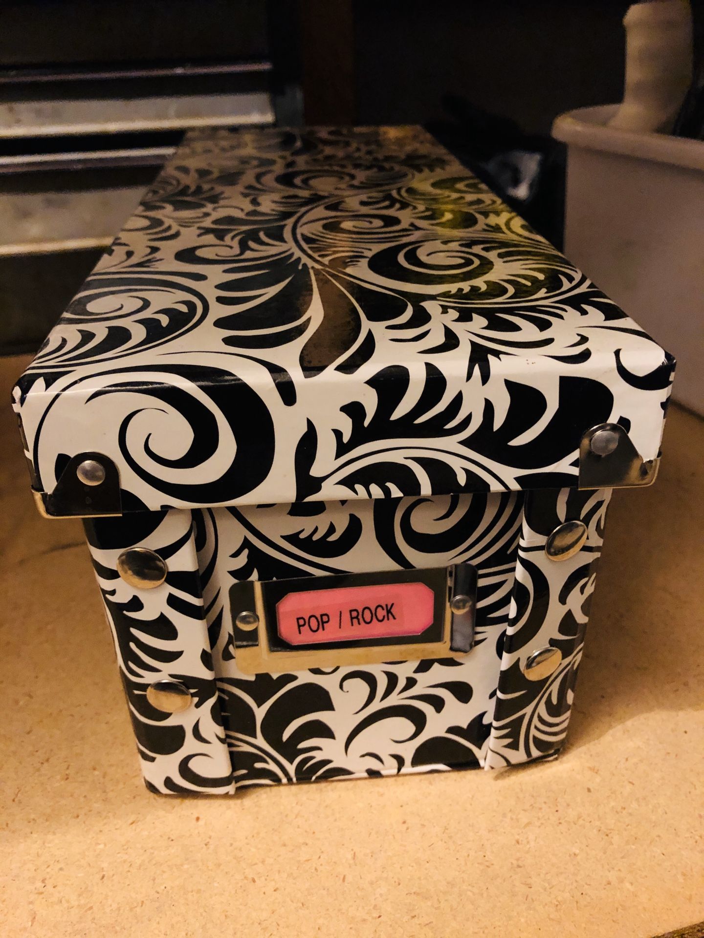 Box of various pop/rock CDs