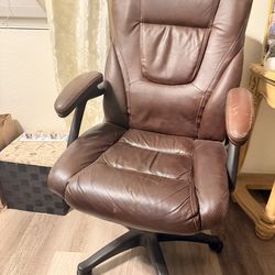Brown rolling office chair