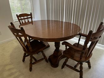 Dining table with three chairs
