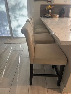 Set of 4 Upholstered Counter-Height Bar Stools – $80