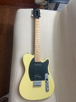 First Act ME 302 Yellow solid body electric guitar