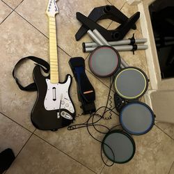 playstation rockband drum set and guitar  