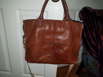 Brown leather satchel with laptop cushioned insert