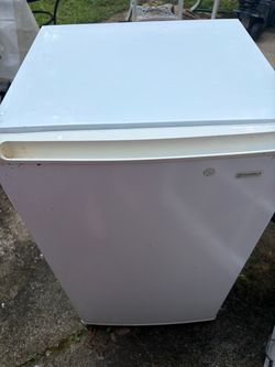 Refrigerator/ freezer. Twice as big as cube fridge. 33” tall.
