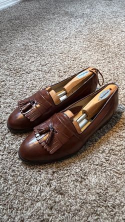 Brown kiltie tassel loafers