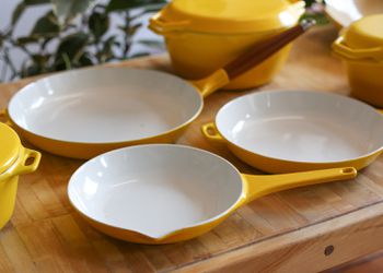 Copco Danish Modern Cast Iron Yellow Enamel Cookware for Sale in