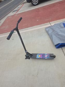 This is a Vault Pro Scooters "Austin" signature pro scooter deck with custom vaporwave