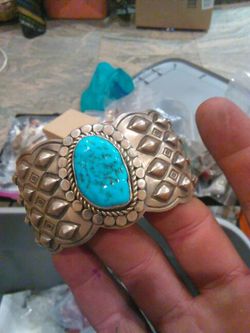 Navajo made silver bracelet with turquoise