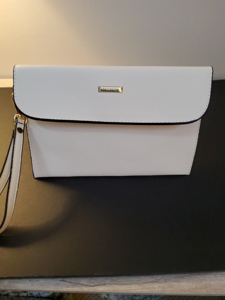 It's A very Clean  Bag  Its A Hand Bag.      Size  . 10'x  7"   .