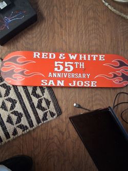 Red and white skate board