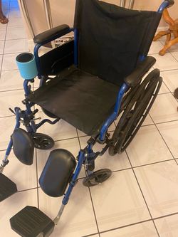 Blue Folding Wheelchair with Footrests