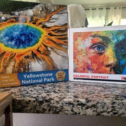 2 Puzzles. New. 