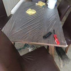 Wooden and leather Dining room table and chairs