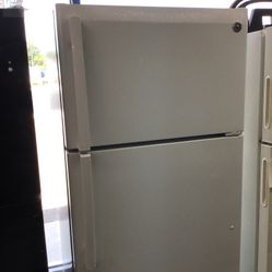 GE 18 Cu Ft Top And Bottom Fridge. 1 year Warranty 