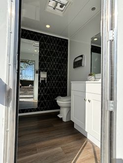 Two Station Men And Women Luxury Restroom Trailer 