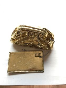 Angel Brinks Gold clutch/wristlet in one