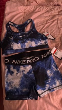 Blue and white Nike pro set
