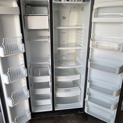 GE Arctica refrigerator. Side by side. Stainless steel. Works perfectly!