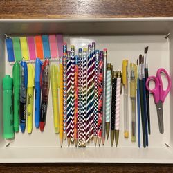 Back to school set: pencils, highlighters, pens, paintbrushes, scissors