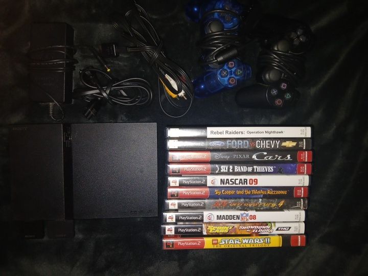Playstation 2 w/ 1 Controller, 16 Games, 2 Memory Cards, New Sealed Sly 2 Band Of Thieves, Tomb Raider II, Spiderman, MOH, LEGO STAR WARS. ALL TESTED