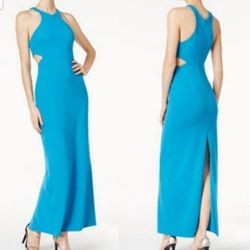 This is a Calvin Klein cutout side gown in blue crepe.