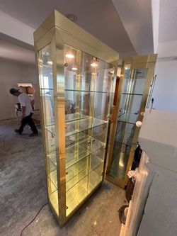 Tall Brass Arnold Display Cabinets
