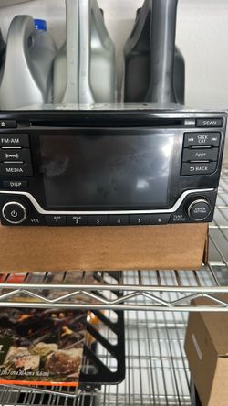 Original radio for Nissan Sentra, 2015, in good condition.
