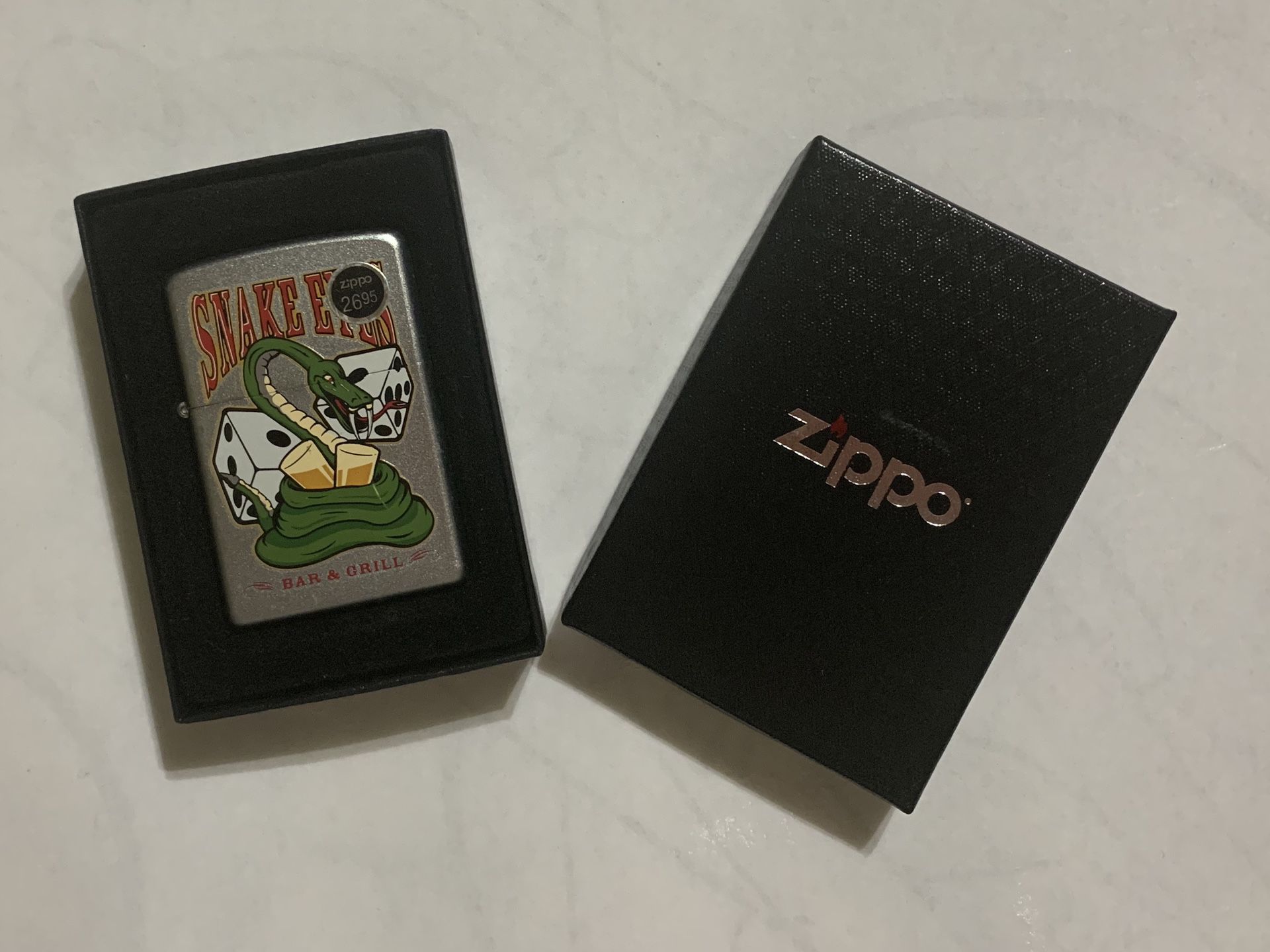 Zippo Lighter , vintage Snake Eye design, new