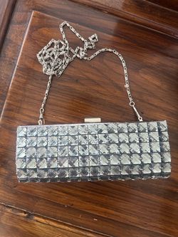 Silver toned crystal clutch bag