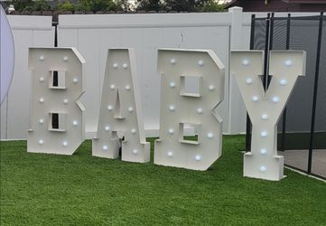 "BABY" marquee with lights
