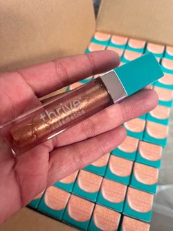 Thrive high shine reviving topper gloss