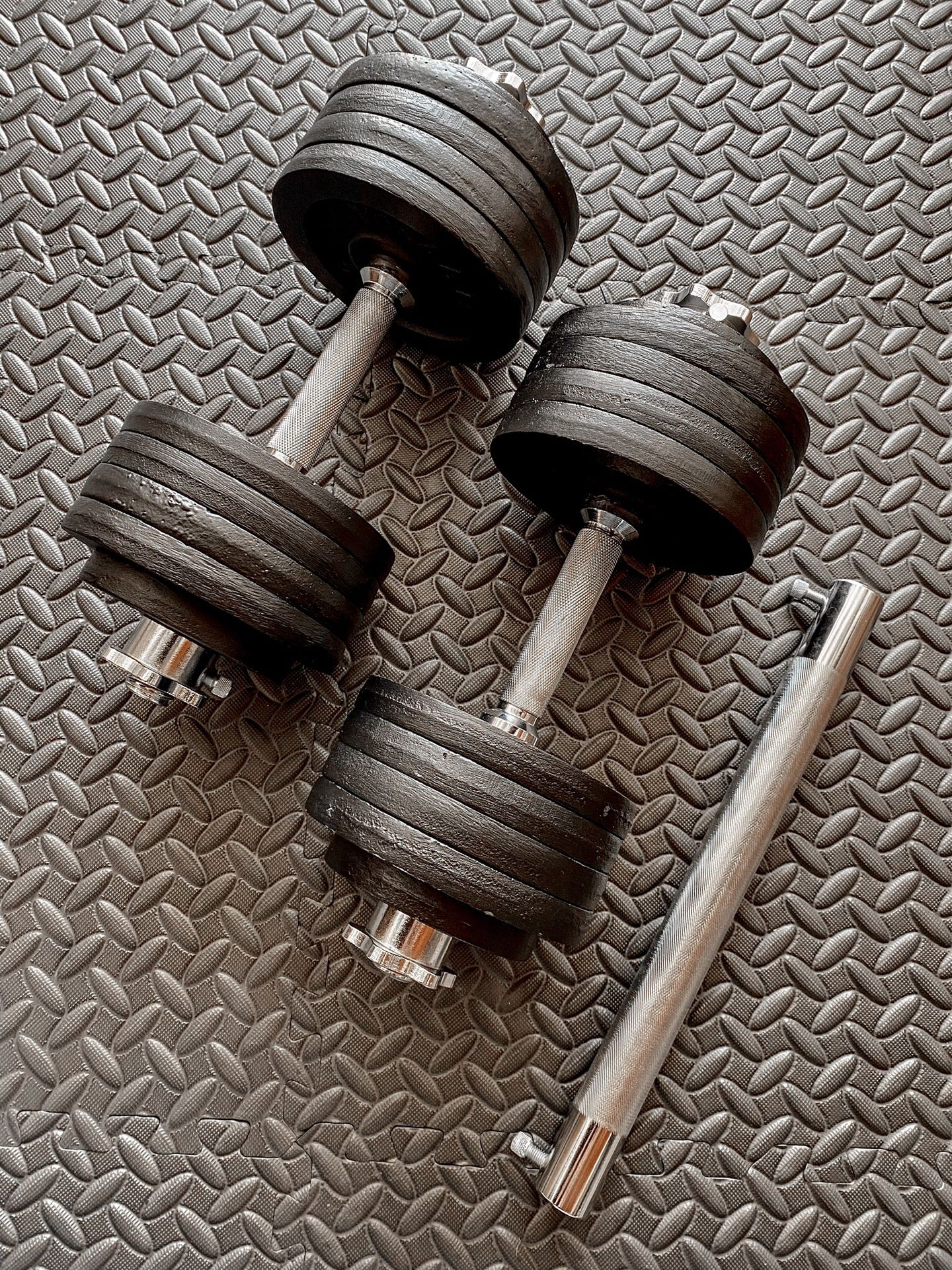 Brand new in box 105 lb (52.5x2) pair adjustable dumbbells with bar barbell attachment (not negotiable)