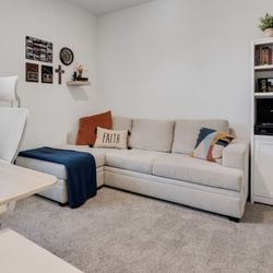 Tan Couch with Reversible Chase 