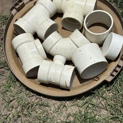 Plumbing Drain Line Fittings Pictured. 
