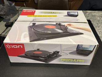 ION Audio Profile LP - Vinyl-Archiving USB Turntable. Not used! Platter rubber sealed. Needle covered! Broke hinge on dust cover while unboxing. All a