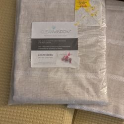 A Pair Of Two Panels Drapes 52 in X 84 in